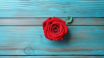 superiore Visualizza di bellissimo rosso rosa su pastello blu dipinto di legno tavolo, generativo ai. foto