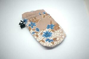 portafoglio con pianta e batik motivi foto