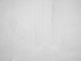 senza soluzione di continuità struttura di bianca cemento parete un' ruvido superficie, con spazio per testo, per un' sfondo... foto