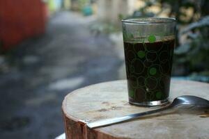 nero caffè con trasparente bicchiere tazza. foto