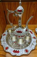 classico musulmano tè impostato con un' moderno stile, vintage teiera ,caffè pentola impostato argento foto
