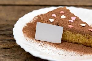 pan di spagna con panna e cioccolato fondente al latte foto