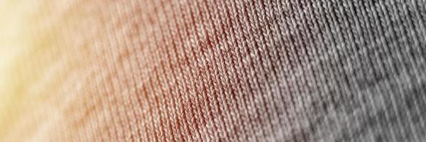 trama tessile tessuto modello di sfondo maglia foto
