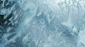 ghiaccio superficie struttura macro tiro su un' blu sfondo, congelato ghiaccio struttura sfondo sfondo tonica, creare ai foto