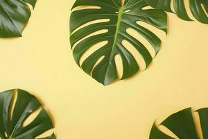 bellissimo tropicale palma Monstera le foglie ramo isolato su pastello giallo sfondo, superiore Visualizza, piatto posizione, alto sopra estate bellezza vuoto design concetto , creare ai foto