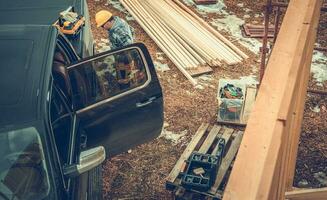 costruzione contraente lavoratore, Raccogliere camion e il lavoro luogo foto