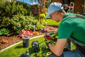 regolazione tubi per giardino irrigazione sistema foto