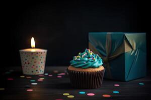 compleanno Cupcake con candela e regalo scatola su buio sfondo. un' Cupcake con un' compleanno candela su esso e un' regalo su il lato, ai generato foto