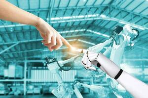 umano mano e robot mano tecnologia e industria cooperazione foto