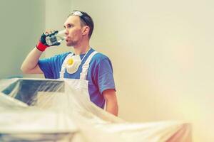 lavoratore potabile acqua foto