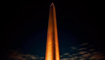 maestoso obelisco illuminato a notte, simboleggiante storia generato di ai foto