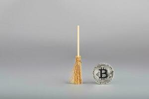 bitcoin e mini spazzatrice. foto