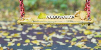 parola depressione composto di di legno lettere. foto