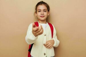 bella giovane ragazza scolara zaino scuola infanzia inalterato foto