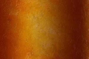 sfondo astratto di colore arancione sfumato con trama di mango essiccato foto
