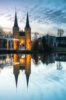 Ostpoort, vecchio storico edificio a delft, il Olanda. foto