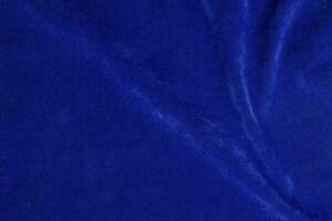 blu velluto tessuto struttura Usato come sfondo. blu tessuto sfondo di morbido e liscio tessile Materiale. Là è spazio per testo. foto