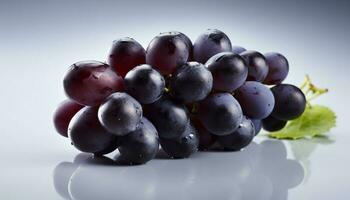 succoso viola uva su un' frondoso ramo, un' rinfrescante merenda generato di ai foto
