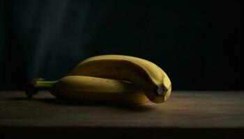 succoso maturo Banana, un' salutare merenda su un' di legno tavolo generato di ai foto