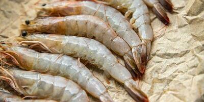 gamberetto crudo gambas fresco frutti di mare gamberetto pasto cibo merenda su il tavolo copia spazio cibo sfondo rustico superiore Visualizza foto