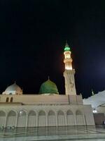 medina, Arabia arabia, Maggio 2023 - bellissimo Visualizza di Masjid al nabawi, medina, alto minareti e moschea a notte. il moschea regali un' bellissimo scena nel il notte luci. foto