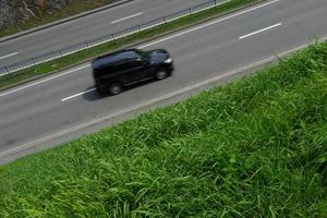 sfondo con strada e auto foto