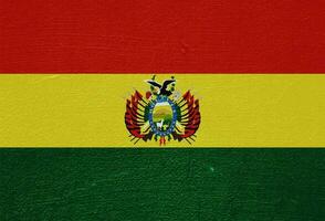 bandiera di Bolivia su un' strutturato sfondo. concetto collage. foto