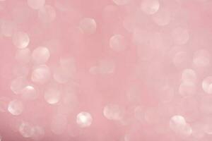 rosa astratto luccichio sfondo con brillante bokeh foto