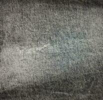 pietra lavare grigio jeans denim tessuto vicino su fotografia, denim jeans stoffa, denim struttura, indaco foto