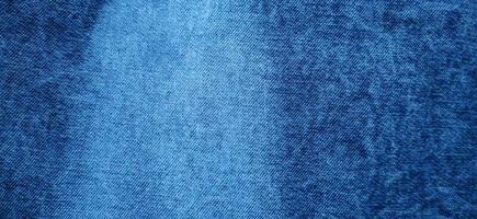 blu denim tessuto vicino su fotografia, denim jeans stoffa, denim struttura, indaco , denim jeans stoffa, denim struttura, indaco foto