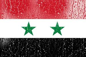 3d bandiera di Siria su un' bicchiere con acqua far cadere sfondo. foto