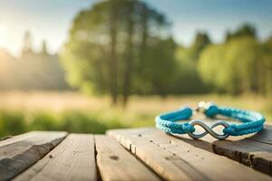 un' vicino su fotografia di un' paio blu braccialetto formatura un infinito simbolo su un' rustico legna con bokeh sfondo foto