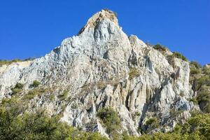 argilla scogliere, Sud isola, nuovo Zelanda foto