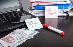 documenti per il rimborso delle tasse, situazione finanziaria, foto