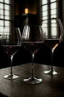 tre vino bicchieri seduta su superiore di un' di legno tavolo. ai generato foto