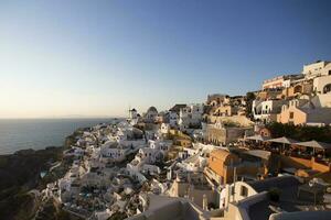 Oia villaggio su santorini isola nel Grecia a tramonto foto