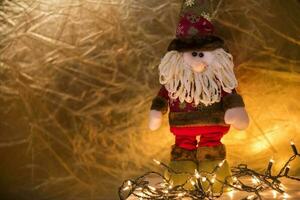 un' Santa Claus Bambola con un' barba e cappello foto