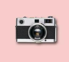 Vintage ▾ vecchio film telecamera su rosa sfondo foto
