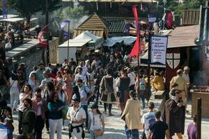 il medievale mercato di obidos, Portogallo è un evento di storico animazione Riempimento esso con colore, musica, odori e periodo costumi di il mezzo età foto