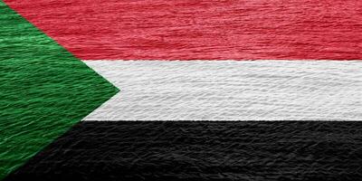 bandiera di repubblica di Sudan su un' strutturato sfondo. concetto collage. foto