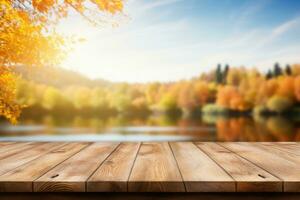 vecchio di legno tavolo per Prodotto Schermo con naturale autunno paesaggio sfondo. foto