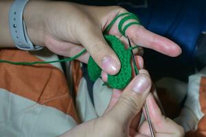 kochet con verde maglieria lana foto