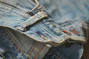 dettaglio di blu jeans cintura foto