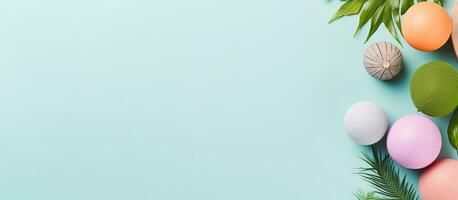 foto di colorato Pasqua uova e palma le foglie su un' vivace blu sfondo con vuoto spazio per testo o design elementi con copia spazio