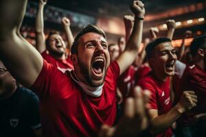 americano calcio fan festeggiare un' vittoria foto