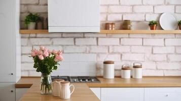 soffitta cucina Consiglio dei ministri e piano di lavoro con bianca mattone parete sfondo. moderno interno per cucinando. controsoffitto nel cenare residenza con fiore arredamento. generativo ai foto