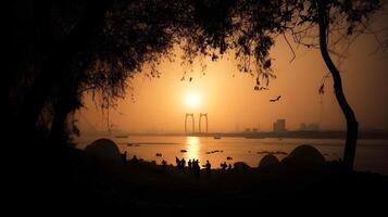 tranquillo spiaggia a alba calma oceano, albero silhouette, d'oro tramonto, ponte e città nel il sfondo. ai generato foto