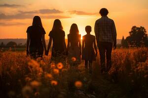 silhouette di amicizia Tenere mani contro il sfondo di un' prato a tramonto ,generativo ai foto