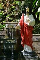 statua di signore Gesù, viso di misericordia, simbolo di cattolico religione, posto per pregare, dare Grazie per di Dio grazia foto