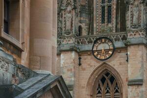 vecchio orologio su parete di st. di maria Chiesa nel Oxford, Inghilterra foto